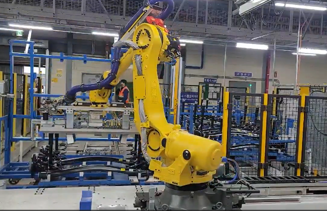 Robotized Rear Suspension Loading System