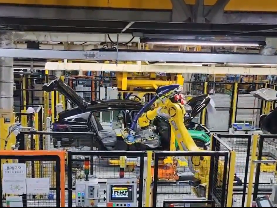 Advanced Robotic Front Seat (RH) Loading on a Continuously Moving Vehicle Line